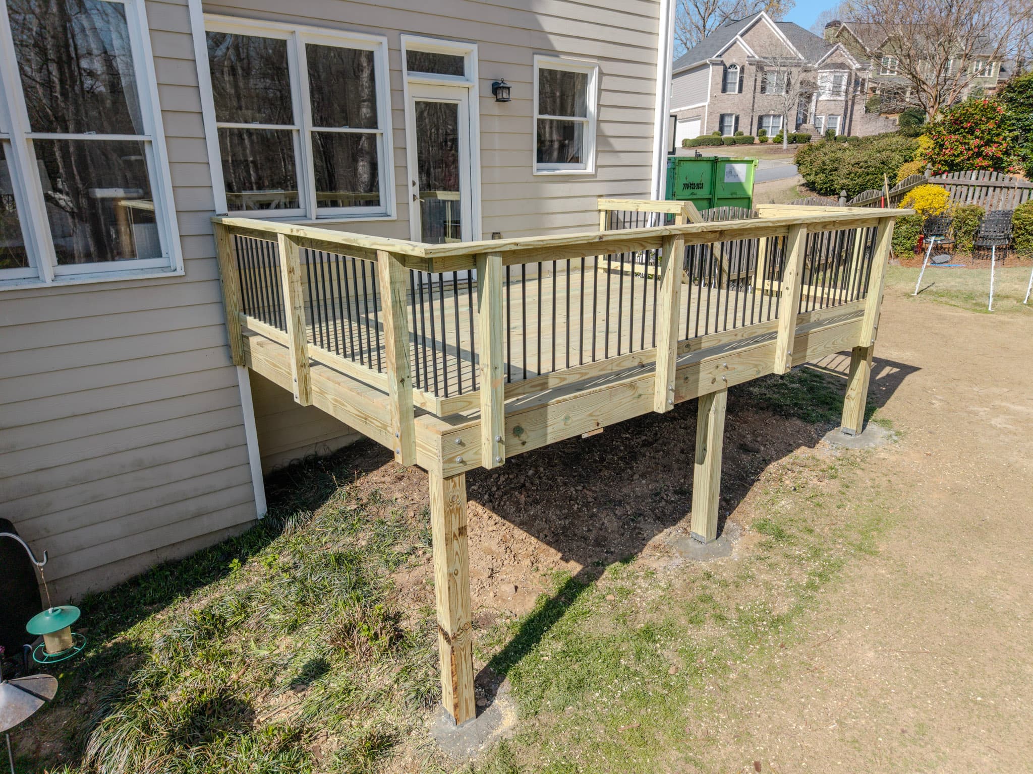 Aerial view of a home's deck and outdoor area