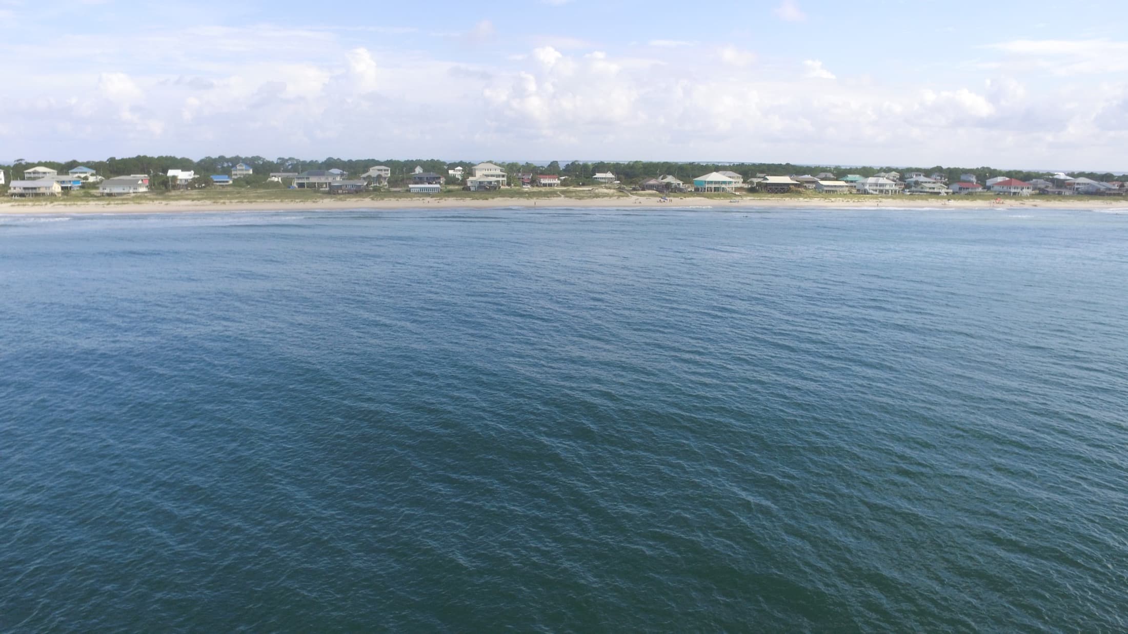 Beachfront homes viewed from offshore